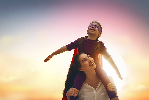 istock Mother and her child playing 598531694