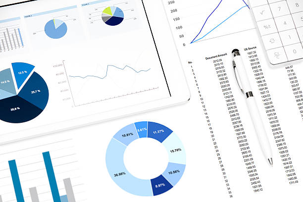 Business chart on the tablet pc and printed media
