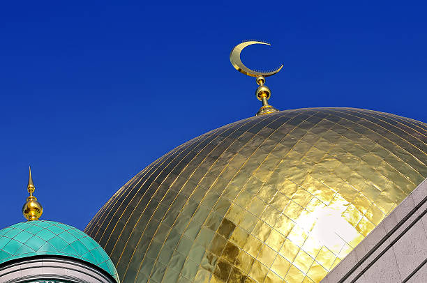 istock Gilded dome and crescent moon Muslim mosque 598534572