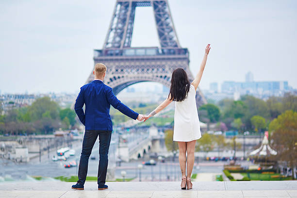 istock Romantic couple in Paris near the Eiffel tower 598534616