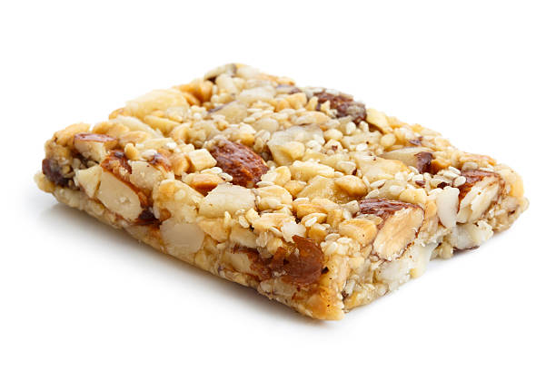 istock Nut and seed bar with Brazil nuts isolated on white. 598537606