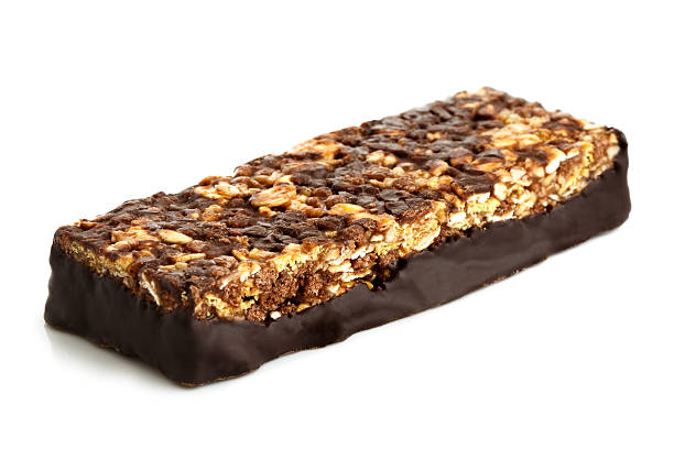 istock Chocolate, oat and nut bar isolated on white. 598537906