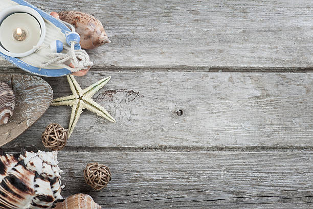 istock Marine items on old wooden background 598538540