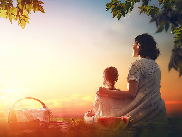 istock Family picnicking together 598539798