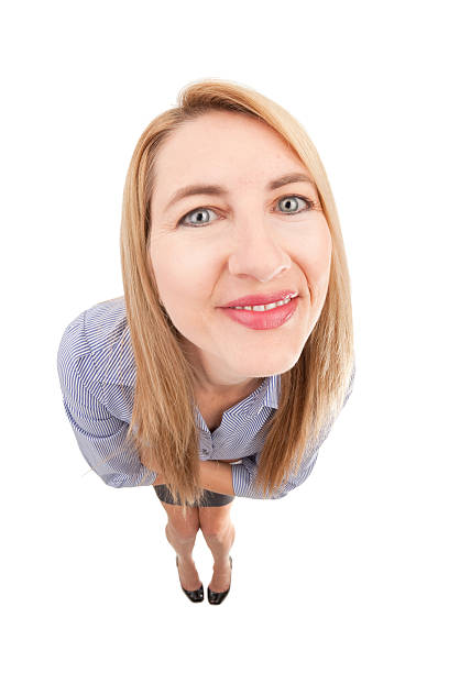 istock Fisheye Smiling Business Woman 598540114