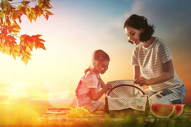 istock Family picnicking together 598540380