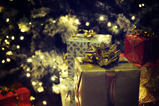 istock Christmas tree with gifts 598540398