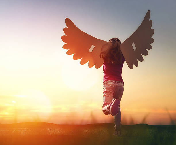 istock Kid with the wings of a bird 598545112