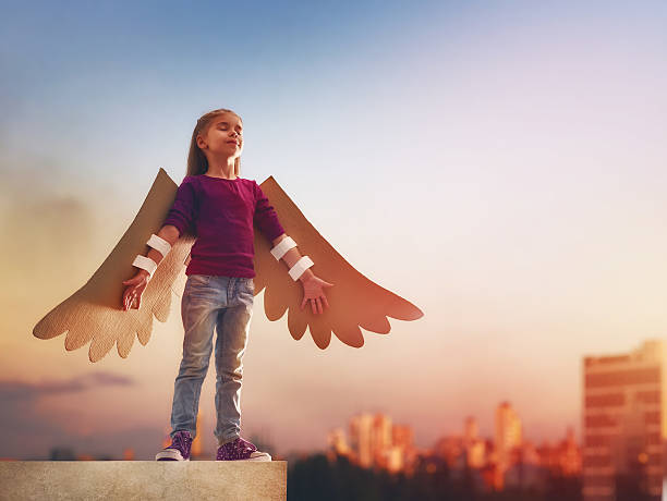 istock Kid with the wings of a bird 598545218