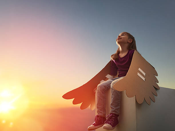 istock Kid with the wings of a bird 598545264