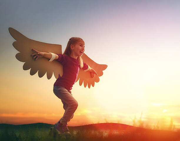 istock Kid with the wings of a bird 598545292