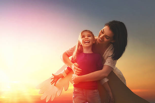 istock Mother and her child playing 598545412