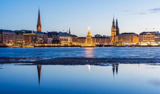 Hamburg town hall and Alster Lake with Christmas market