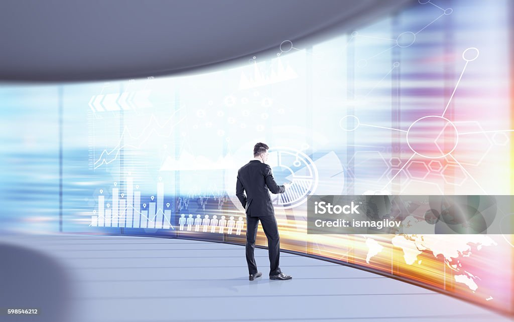 Statistician working Man analyzing information in futuristic office. Concept of stats importance. Elements of this image furnished by NASA. Toned image. Double exposure Adult Stock Photo