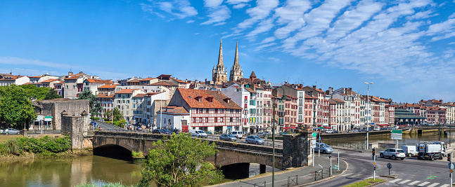 Panorama of Bayonne with bridge Pont du Genie across the Nive river on the front view, Aquitaine, France