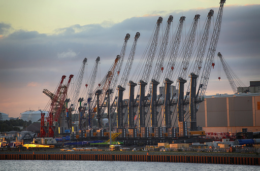 Rostock , Germany - August 14, 2016: Container terminal and cranes in the port of Warnemunde. Rostock is largest Baltic port(photographed early in the morning)in Rostock, Germany