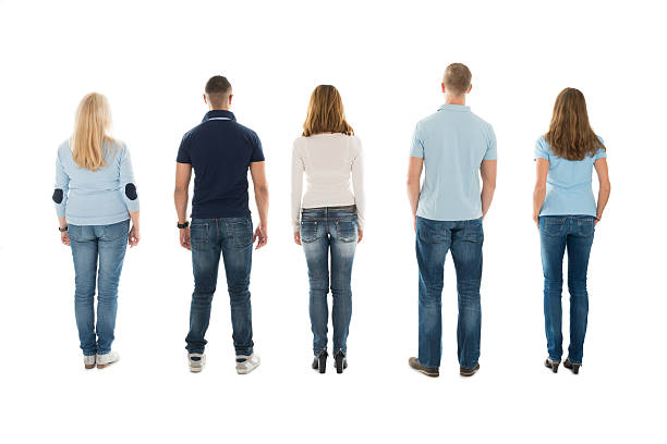 istock Rear View Of People Standing In Row 598549626
