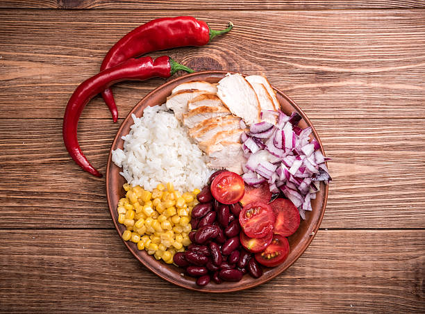 istock Homemade mexican chicken burrito bowls . 598549718