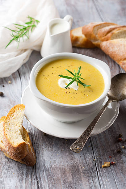 istock Vegetable cream soup in a white bowl 598551280