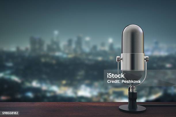 Mic On Night City Background Stock Photo - Download Image Now - Radio, Microphone, Arts Culture and Entertainment