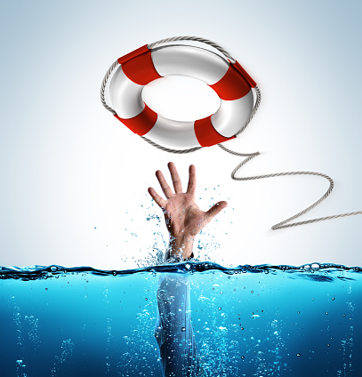 Concepto de rescate - Salvavidas como ayuda del empresario que se ahoga photo