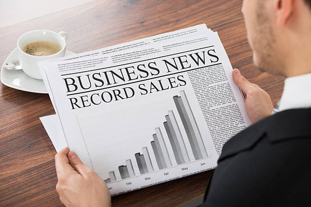 istock Businessman Reading Newspaper 598560214