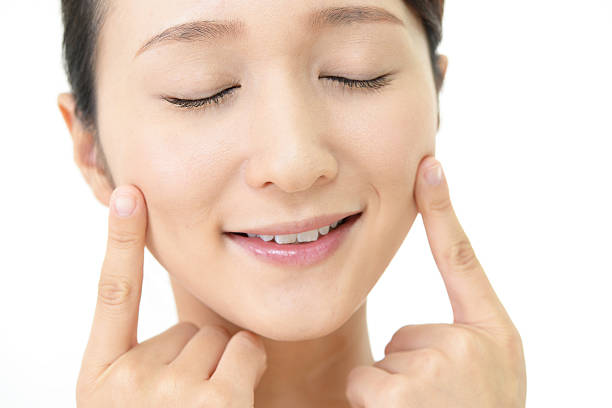 istock Beautiful young woman with closed eyes 598560374