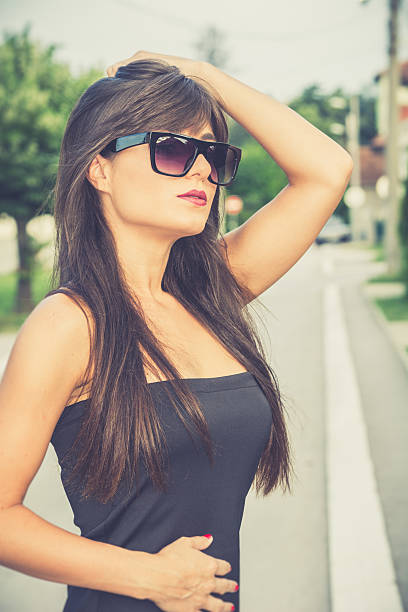 Outdoors portrait of a young brunette on the street