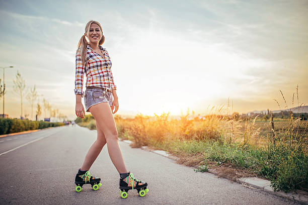 istock Pretty girl on roller skates 598562322