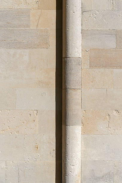 istock Old stone wall closeup architectural detail background 598562502