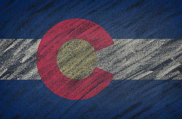 istock Colorado flag painted with colored chalk on a blackboard. 598563196