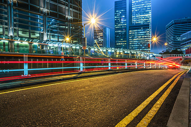 istock blurred traffic in downtown district,hong kong,china 598566204