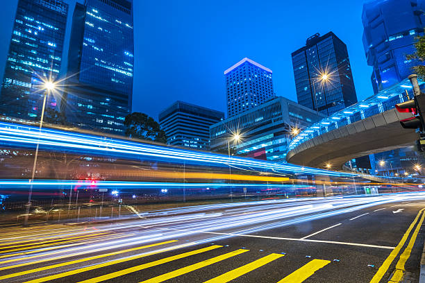 istock blurred traffic in downtown district,hong kong,china 598566716