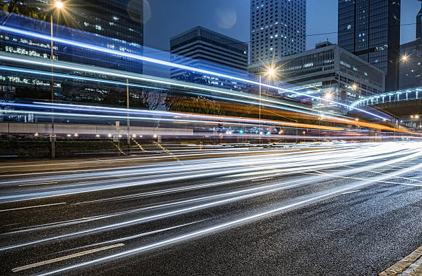 istock blurred traffic in downtown district,hong kong,china 598566754
