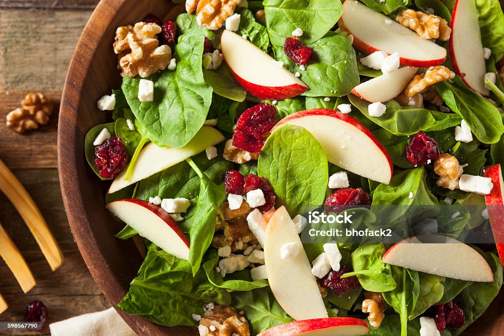 Homemade Autumn Apple Walnut Spinach Salad Homemade Autumn Apple Walnut Spinach Salad with Cheese and Cranberries Apple - Fruit Stock Photo