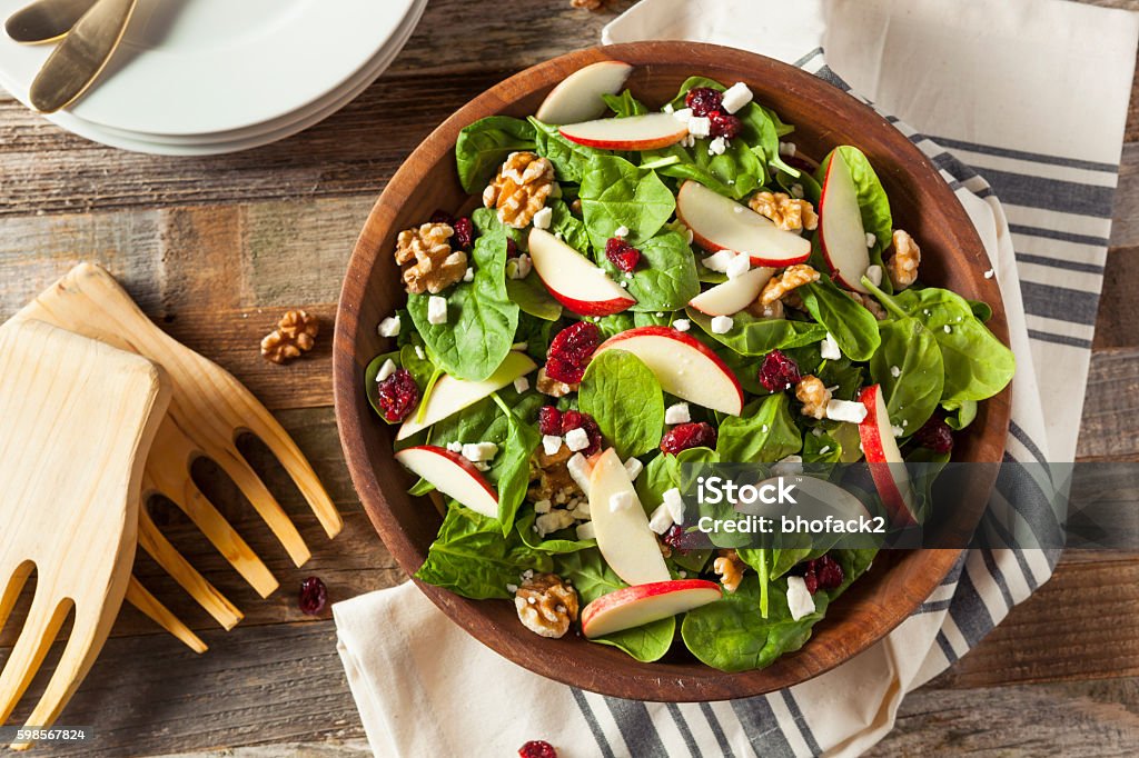 Homemade Autumn Apple Walnut Spinach Salad Homemade Autumn Apple Walnut Spinach Salad with Cheese and Cranberries Apple - Fruit Stock Photo