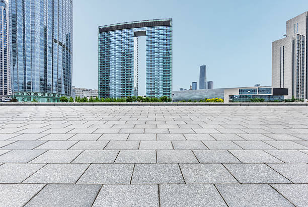 istock Empty brick floor with city skyline 598569196