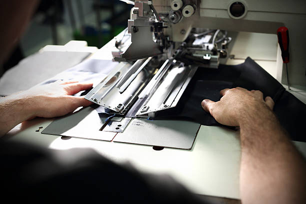 istock Production of clothes, sewing on a machine 598570216
