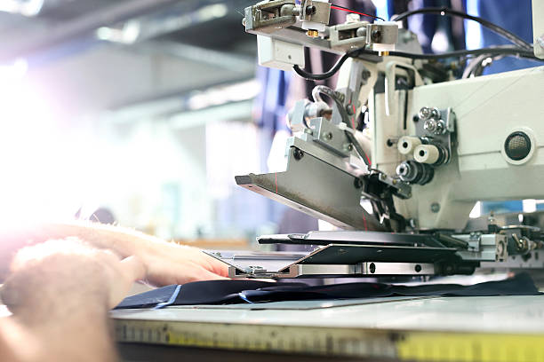 istock Production of clothes, sewing on a machine 598570778
