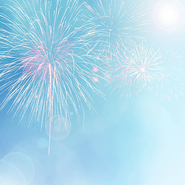 istock Colorful fireworks on blue bokeh background with lens flare 598571098