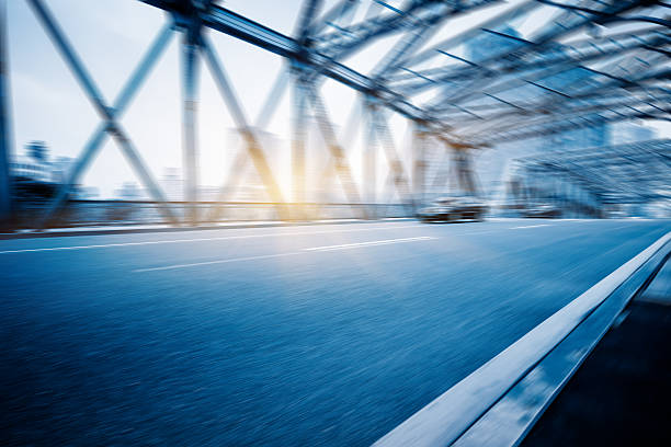 istock City road with moving traffic 598571754
