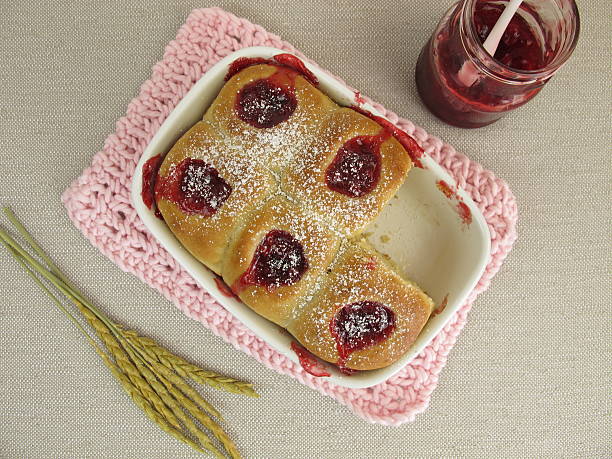 istock Sweet buns with lingonberry jam 598571872