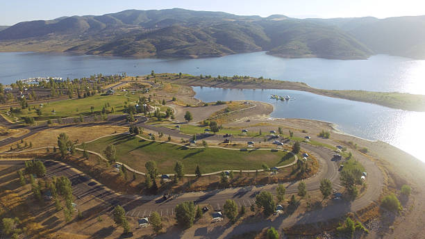 Jordanelle Reservoir, Deer Valley, Utah Jordanelle Reservoir in Deer Valley, Utah during summertime on a blue sky morning deer valley resort stock pictures, royalty-free photos & images