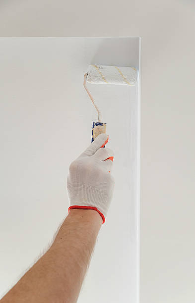 istock Painting the ceiling and walls. 598572990