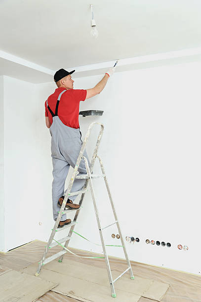 istock Painting the ceiling and walls. 598573106