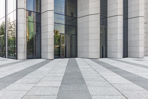 Empty brick floor with modern building in Shanghai