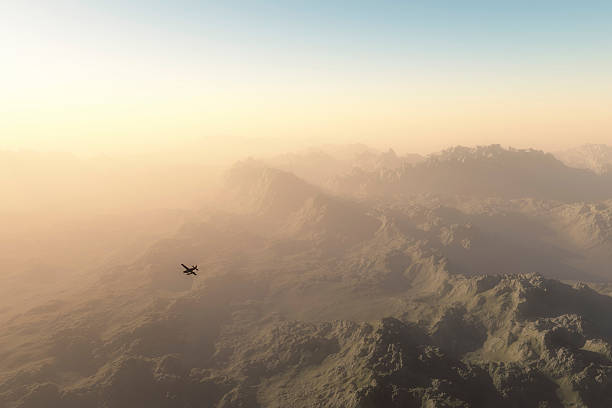 istock Private plane over misty mountains at dawn 598666462