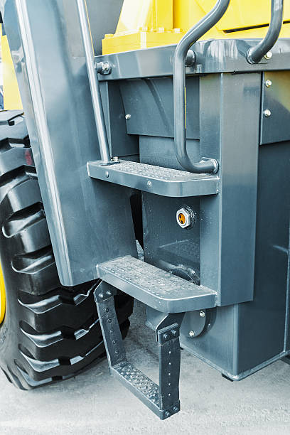 istock metal staircase with steps on the tractor 598671484