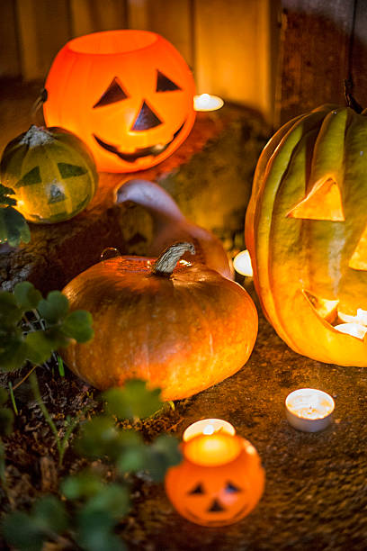 istock Halloween pumpkin head jack lantern on wooden background 598672566