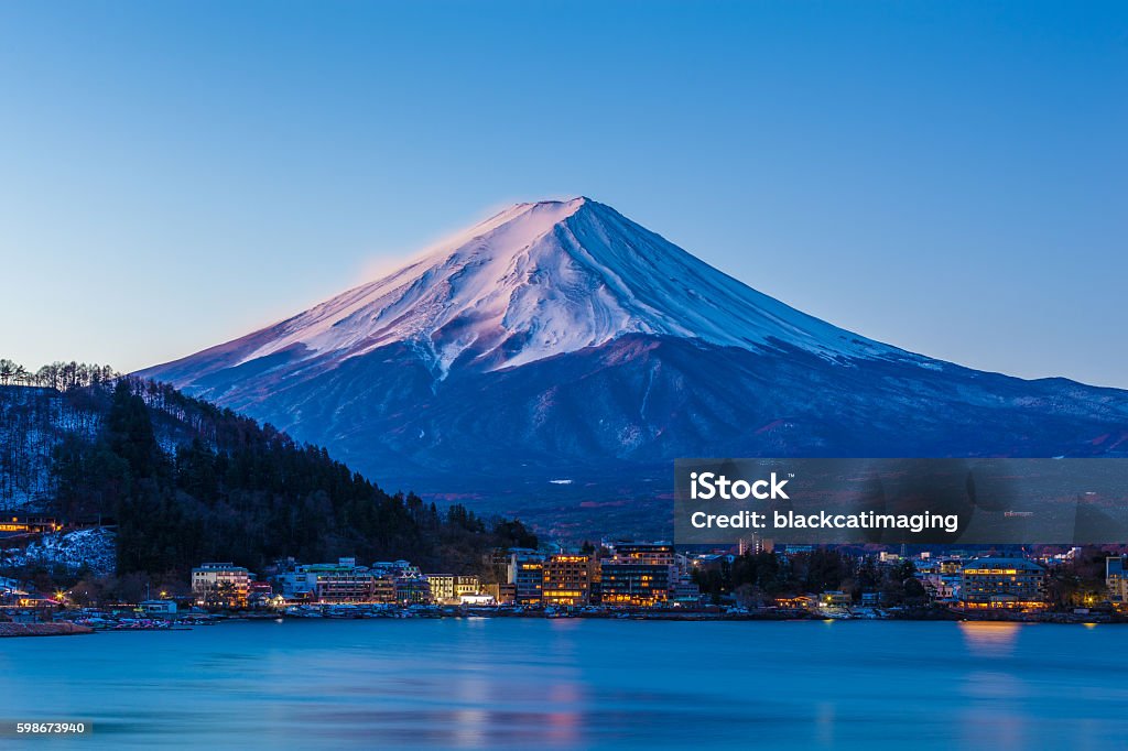 Mount Fuji at dawn from Fuji Lake Kawaguchi during winter Mt. Fuji Stock Photo